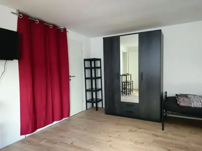 Ein Bett oder Betten in einem Zimmer der Unterkunft Modern Appartement near city of Darmstadt
