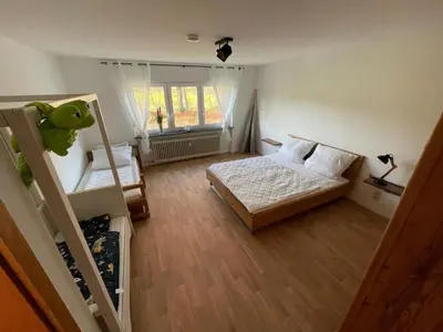 Ein Bett oder Betten in einem Zimmer der Unterkunft Mühlenhof am Pferdestall