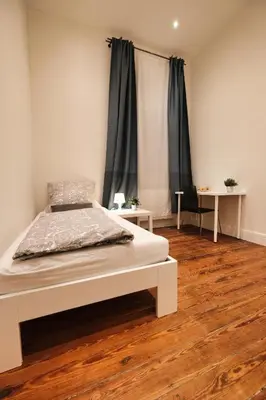 Ein Bett oder Betten in einem Zimmer der Unterkunft Groundfloor Monteurswohnung