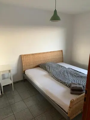 Ein Bett oder Betten in einem Zimmer der Unterkunft Blick über Heilbronn near IPAI