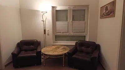 Ein Sitzbereich in der Unterkunft Ferienwohnung im Heckgewann