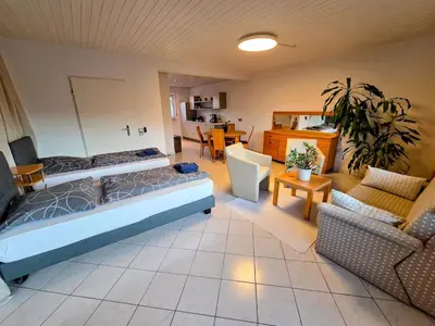 Ein Sitzbereich in der Unterkunft Geräumige Wohnung mit 4 Betten und Balkon