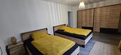 Ein Bett oder Betten in einem Zimmer der Unterkunft Stilvolle Unterkunft mit Wohlfühlfaktor