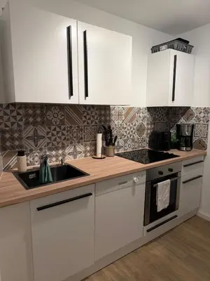 Küche/Küchenzeile in der Unterkunft S&G Home Stilvolles 2-Zimmer-Apartment in zentraler Lage, Komfort & Entspannung garantiert!
