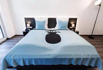 Ein Bett oder Betten in einem Zimmer der Unterkunft Mood Studios