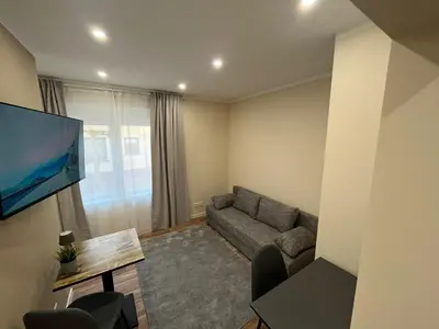 Ein Sitzbereich in der Unterkunft Lumio Apartment 3