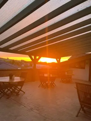 Blick auf den Sonnenuntergang/Sonnenaufgang von des Gasthauses aus oder aus der Nähe
