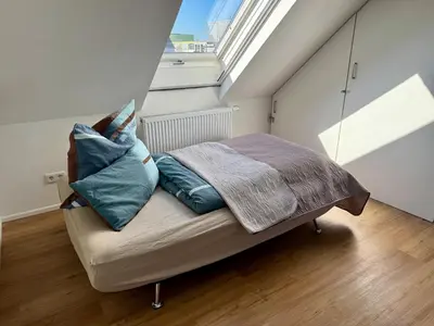 Ein Bett oder Betten in einem Zimmer der Unterkunft Ruhige Wohnung - ideal für Urlaub und Business