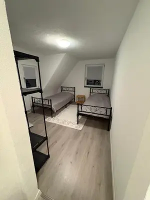 Ein Bett oder Betten in einem Zimmer der Unterkunft Moderne Apartments Meimsheim bis 5 Personen Nahe Tripsdrill
