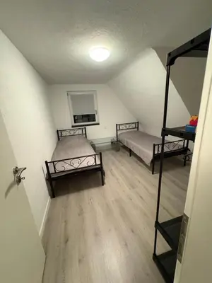Ein Bett oder Betten in einem Zimmer der Unterkunft Moderne Apartments Meimsheim bis 5 Personen Nahe Tripsdrill