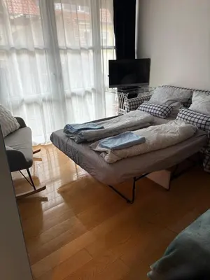 Ein Bett oder Betten in einem Zimmer der Unterkunft Hübsch und ruhig
