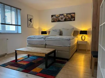 Ein Bett oder Betten in einem Zimmer der Unterkunft Modern Apartment Karlsruhe City Center