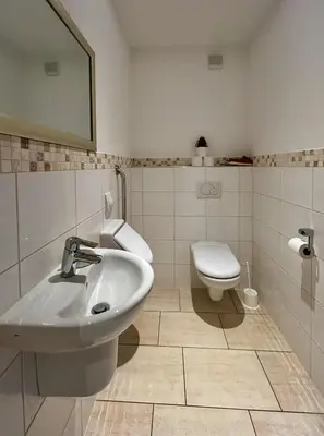 Ein Badezimmer in der Unterkunft Ferienwohnung an der Kapelle
