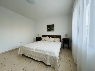 Ein Bett oder Betten in einem Zimmer der Unterkunft Ferienwohnung an der Kapelle