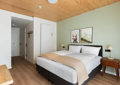 Ein Bett oder Betten in einem Zimmer der Unterkunft Limehome Mannheim City Center