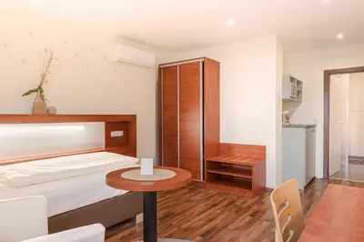 Ein Bett oder Betten in einem Zimmer der Unterkunft Hotel Victoria