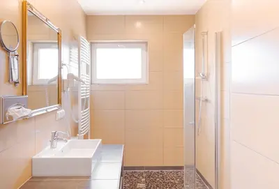 Ein Badezimmer in der Unterkunft Hotel Victoria
