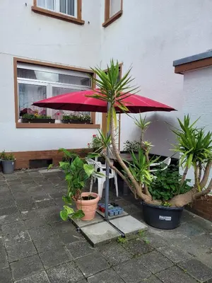 Ein Garten an der Unterkunft Thatsani Vacation Rental