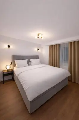 Ein Bett oder Betten in einem Zimmer der Unterkunft MIRANA Home l Modernes Apartment Kaiserslautern