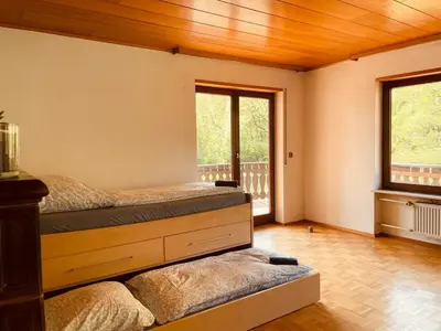 Ein Bett oder Betten in einem Zimmer der Unterkunft Odw homes - Large country house with three apartments and garden