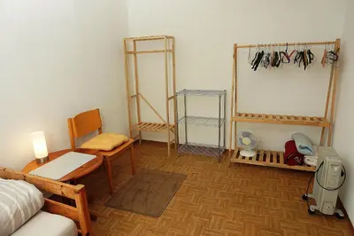 Ein Bett oder Betten in einem Zimmer der Unterkunft Ganze Wohnung in Karlsruhe, 2 Schlafzimmer, 3 Betten, Küche, Bad, Altbau, Stadtmitte