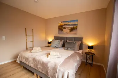 Ein Bett oder Betten in einem Zimmer der Unterkunft Glanzvoll, moderne Wohnung