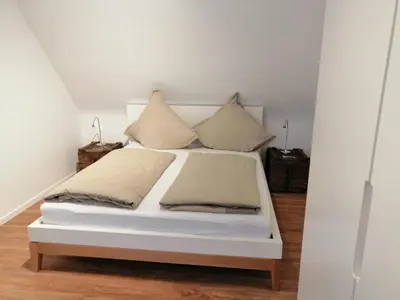 Ein Bett oder Betten in einem Zimmer der Unterkunft Weingut Stefan Meyer
