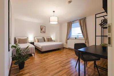 Ein Bett oder Betten in einem Zimmer der Unterkunft Moderne 2-Zimmer Wohnung - kostenloser Parkplatz