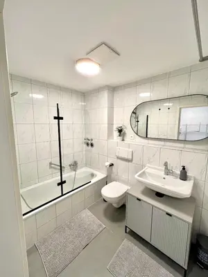 Ein Badezimmer in der Unterkunft Stilvolles & helles Apartment mit Sonnen-Terrasse