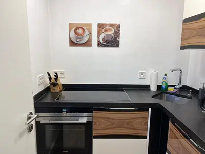 Küche/Küchenzeile in der Unterkunft Apartment Porschenahe Ferienwohnung für Klang-Liebhaber by Interhome