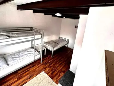 Ein Bett oder Betten in einem Zimmer der Unterkunft RoomZ Hostel am Hockenheimring