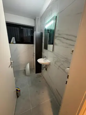 Ein Badezimmer in der Unterkunft Großzügige OG Ferienwohnung in Linkenheim frieden apartments