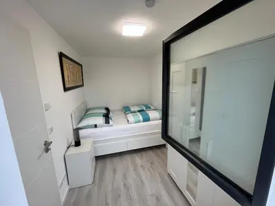 Ein Bett oder Betten in einem Zimmer der Unterkunft Beautiful apartment in Bürstadt