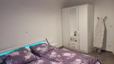 Ein Bett oder Betten in einem Zimmer der Unterkunft Toumaka-TopLage