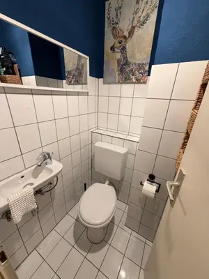 Ein Badezimmer in der Unterkunft Großzügige Maisonette nahe Innenstadt Altbauflair