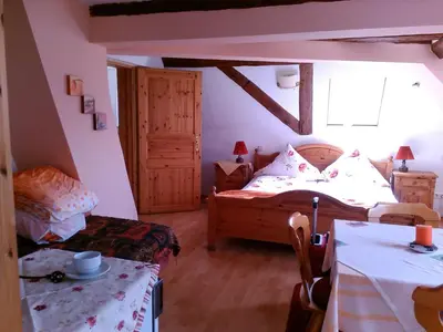 Ein Bett oder Betten in einem Zimmer der Unterkunft Gasthaus Korfu
