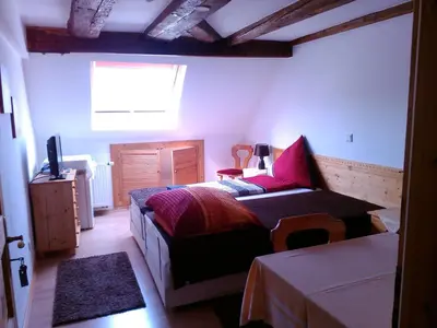 Ein Bett oder Betten in einem Zimmer der Unterkunft Gasthaus Korfu