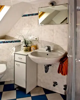 Ein Badezimmer in der Unterkunft Gasthaus Korfu