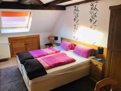 Ein Bett oder Betten in einem Zimmer der Unterkunft Gasthaus Korfu