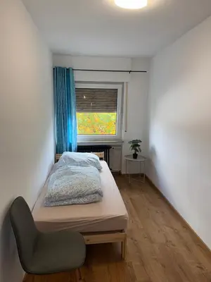 Ein Bett oder Betten in einem Zimmer der Unterkunft Land Lord Apartments 3-4 Sleeping Rooms near Frankfurt am Main