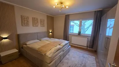 Ein Bett oder Betten in einem Zimmer der Unterkunft Exclusive complete apartment for 6 people