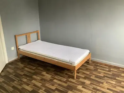 Ein Bett oder Betten in einem Zimmer der Unterkunft Adler
