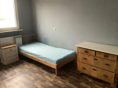 Ein Bett oder Betten in einem Zimmer der Unterkunft Adler