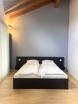 Ein Bett oder Betten in einem Zimmer der Unterkunft D&D Guesthouse