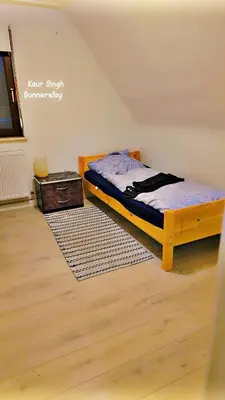 Ein Bett oder Betten in einem Zimmer der Unterkunft Monteure Wohnung in Bad Friedrichshall