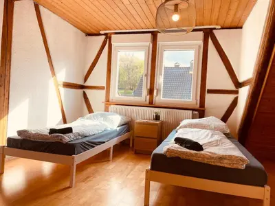 Ein Bett oder Betten in einem Zimmer der Unterkunft Odw Homes - Charming Home in Gorxheimertal