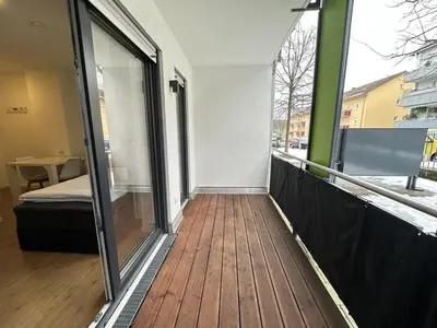 Ein Bett oder Betten in einem Zimmer der Unterkunft Business Apartment mit Balkon, 1 Person, zentrumsnah