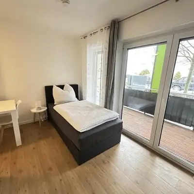 Business Apartment mit Balkon