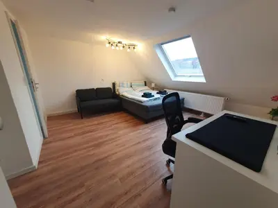 Ein Sitzbereich in der Unterkunft Gemütliche zentrale 1Zimmer-DG-Wohnung in Mühlacker
