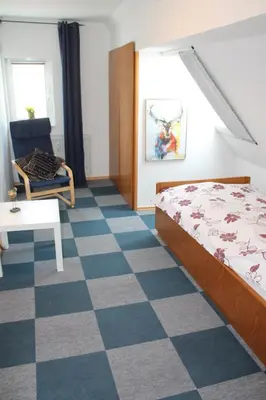 Ein Bett oder Betten in einem Zimmer der Unterkunft Ferienwohnung Oberle